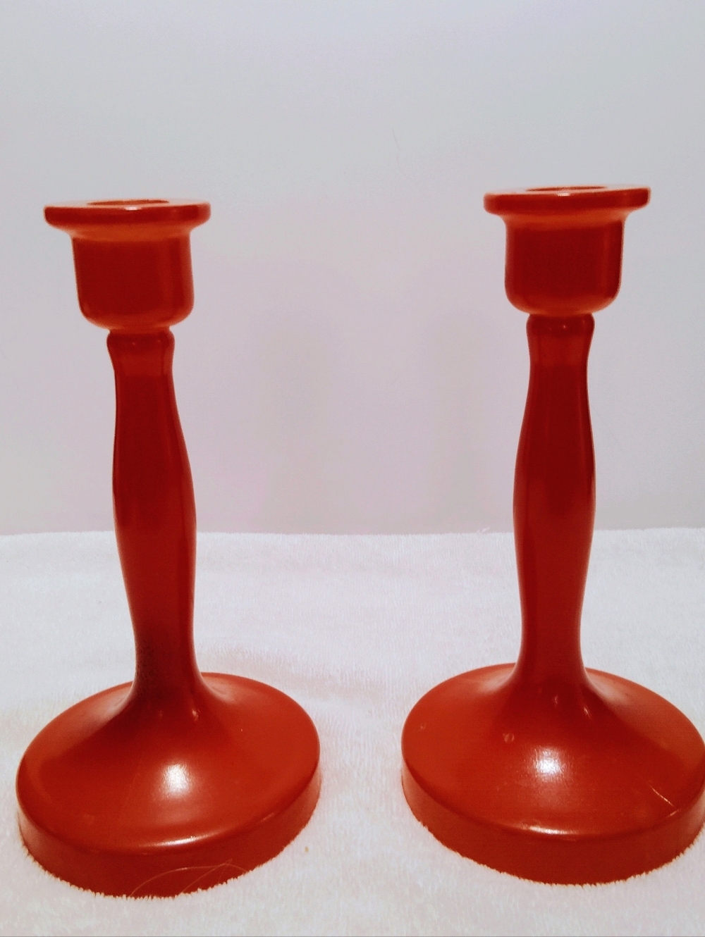 Vintage Pair of Mid Century Tangerine Glass Candlestick Holders